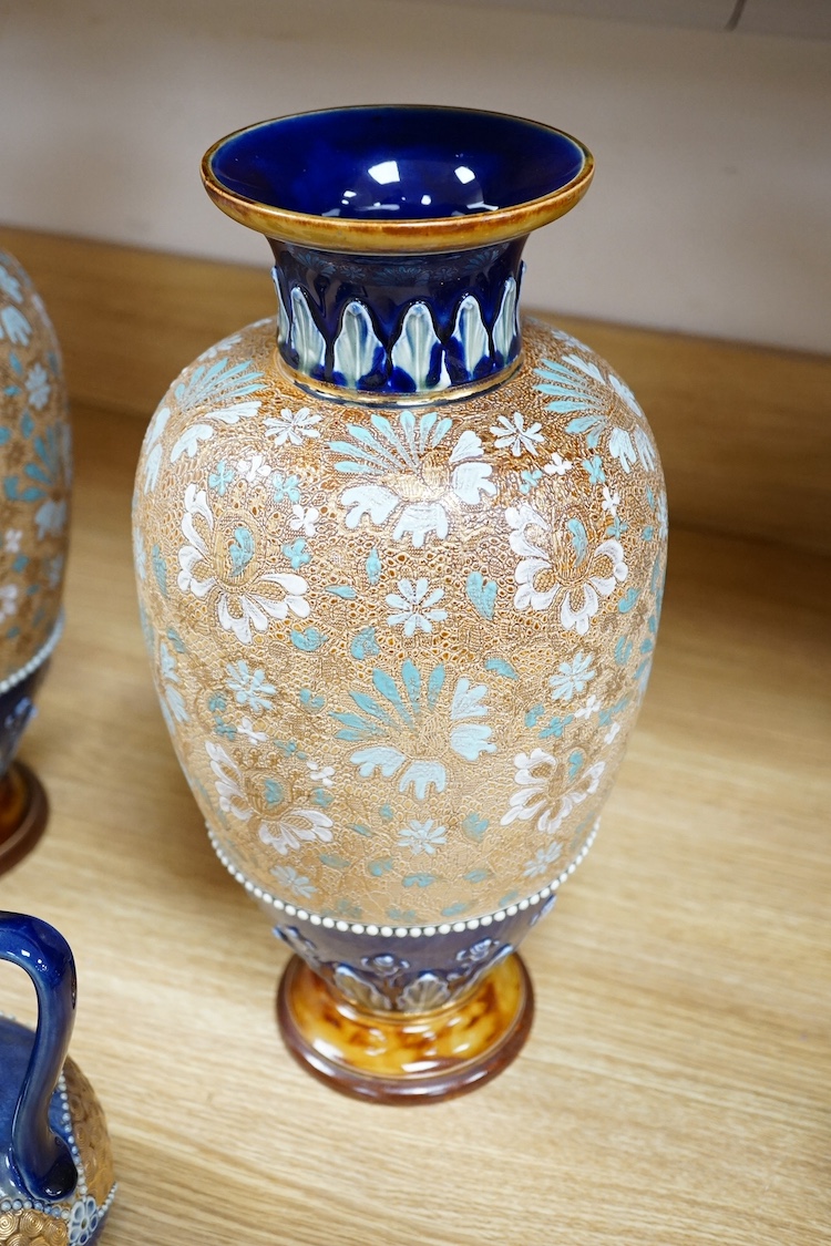 A pair of Doulton stoneware floral vases and a pair of similar jugs, largest 36cm high. Condition - good